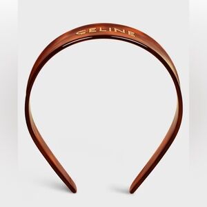 Celine headband in acetate and steel, specifically in a blond havana color.